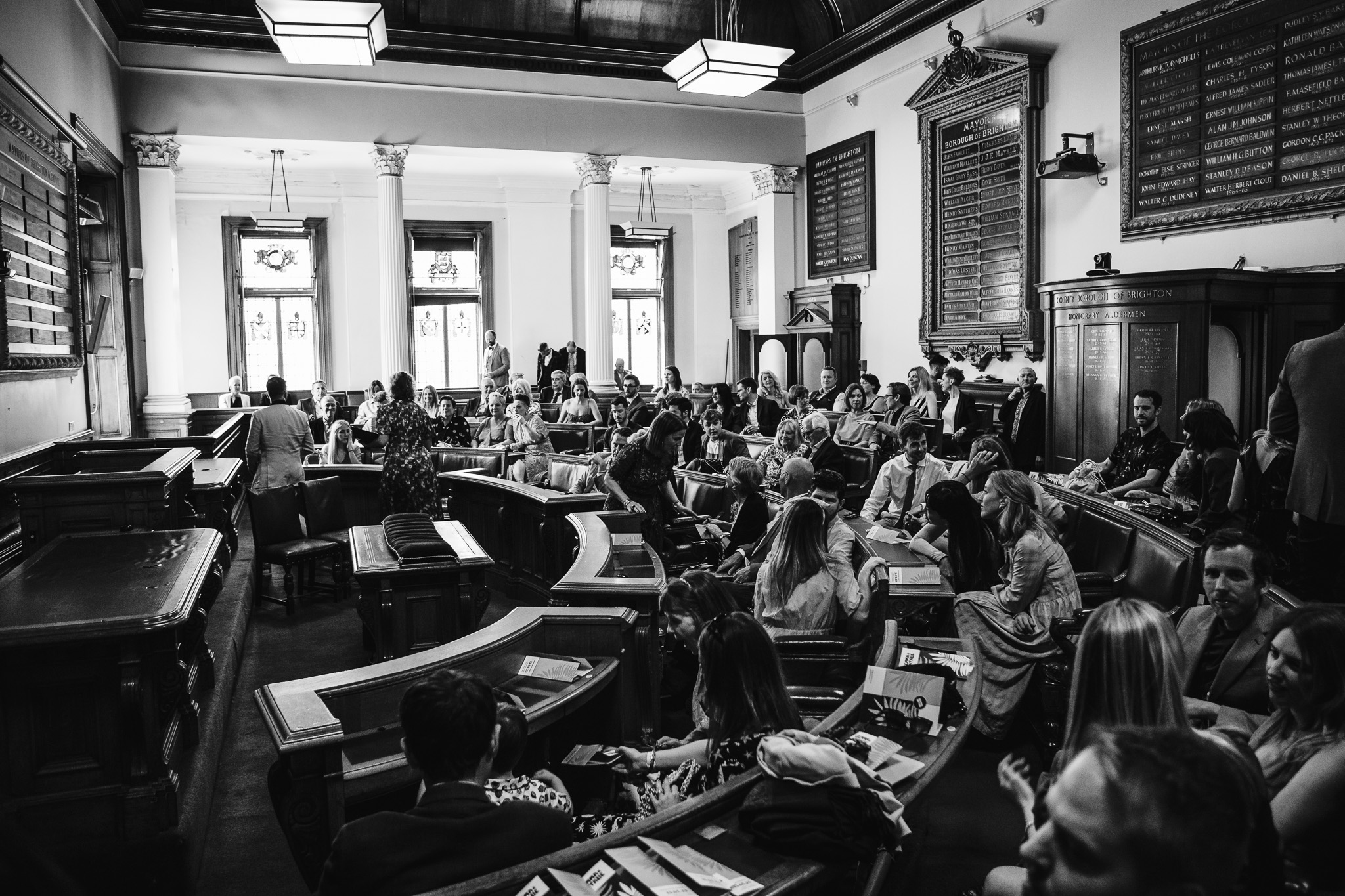 The guests take their seats inside Brighton Town Hall as they wait for the wedding to start.